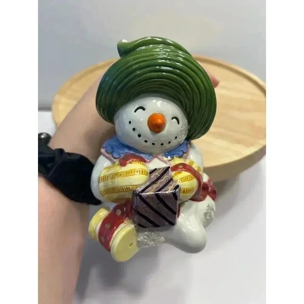 Fitz and Floyd Snowman Creamer from Frosty Folks Collection Holding Gift - Picture 5 of 7